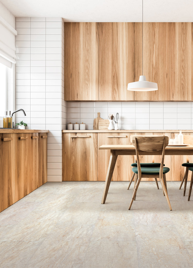 stone look luxury vinyl tile flooring in kitchen with wood cabinetry and wood dining table with matching chairs
